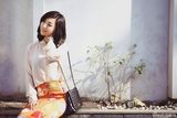 组图：张馨心户外写真 阳光温暖甜美可人