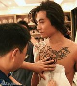 幻灯：揭秘严宽“浪子燕青”纹身背后的故事