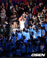 组图：李英爱压轴亮相惊喜全场 点燃亚运圣火