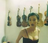 组图：林熙蕾早年大尺度写真 轻解内衣双峰傲人