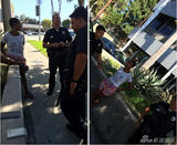 组图：黑人女星街头吻老公 被警察当妓女铐押