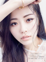 组图：张靓颖玩时尚创新 发新歌歌词版电子写真