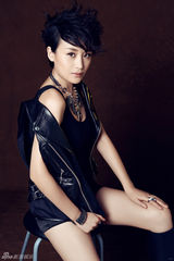 组图：傅淼写真化身百变娇娃 优雅狂野双重魅惑