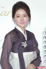 组图：郭晶晶携夫恩爱亮相 如再怀胎想生女儿