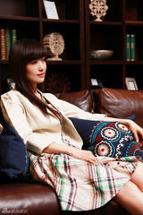 组图：歌手苏曼清新写真集曝光 尽显优雅知性美