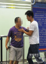 组图：章子怡潮装离京 疑默许司机对偷拍动粗