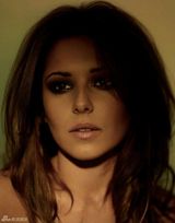 组图：英国美女谢尔丽-崔迪性感写真秀美腿纹身