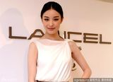 组图：倪妮白裙代言气质优雅宛若女神