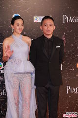 组图：刘嘉玲金像奖吸睛 透视裤装携手梁朝伟