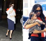 组图：维多利亚抱女儿现身 小7头戴蝴蝶结可爱