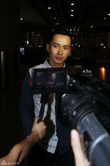 组图：快男阿穆隆出狱回京