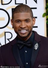 组图：亚瑟小子微笑自信踩红毯 紫色西装显高贵