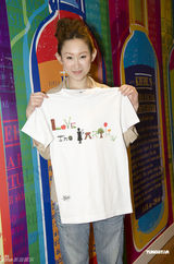 组图：林海峰王菀之携手出席活动宣传环保