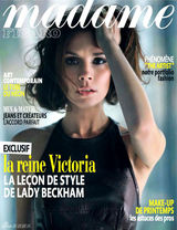 组图：贝嫂维多利亚卷发登杂志封面眼神犀利