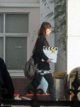 高清图：警车为《山楂树》开道 张导身边两神秘女子