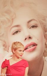 组图：米歇尔-威廉姆斯亮相日本 红裙优雅靓丽