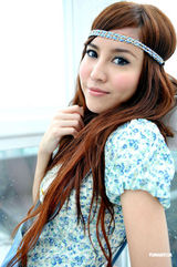 高清组图：羽翘美容书爆性感私照 与大S争“王位”