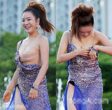 组图：富川电影节红毯 女星肩带滑落走光露乳