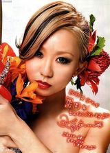 组图：幸田来未爆乳装登封面 明艳红唇慵懒妩媚