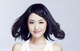 组图：张馨心素雅时尚大片尽显清爽可人
