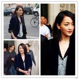 组图：周迅亮相巴黎时装周 马甲裤装休闲帅气