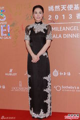 群星闪耀嫣然基金晚宴 王菲旗袍装与李亚鹏恩爱