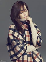 高清组图：紫雨林成员金允儿冬装写真彰显干练气质